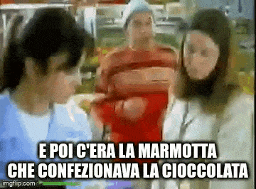 a man and two women are standing next to each other in an advertisement for a chocolate bar .