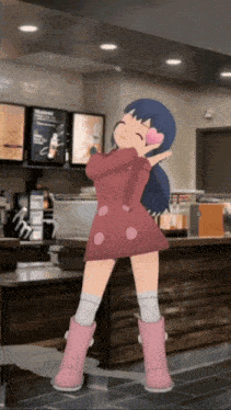 a girl in a pink dress and pink boots is dancing in a starbucks