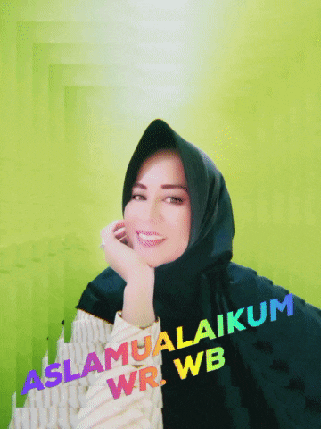 a woman wearing a hijab is smiling in front of a green background