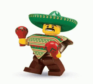 a lego figure wearing a sombrero and poncho is holding boxing gloves .