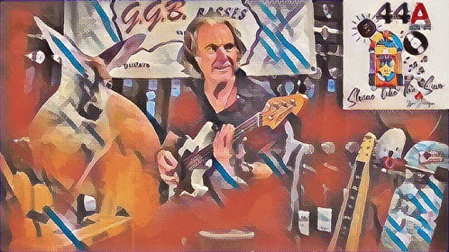 a man is playing a guitar in front of a sign that says 44a