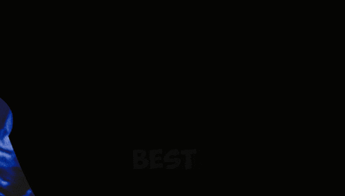 a man wearing glasses is covering his face with his hand and the word best is visible