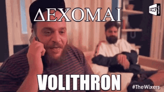 a man talking on a cell phone with the words volithron written below him