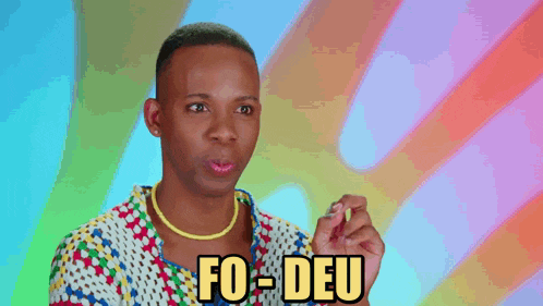 a man in a colorful shirt says " fo deu "