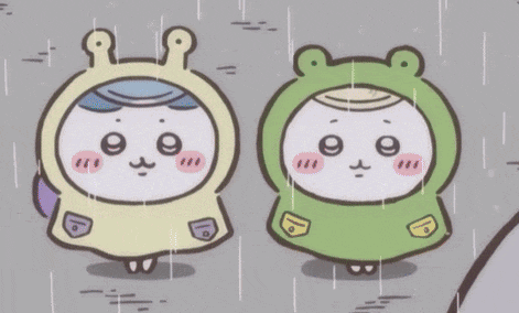 two cartoon characters are standing in the rain wearing frog and alien costumes