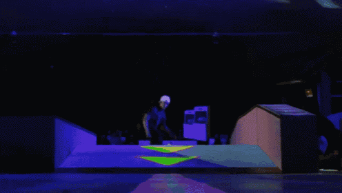 a person is doing a trick on a skateboard