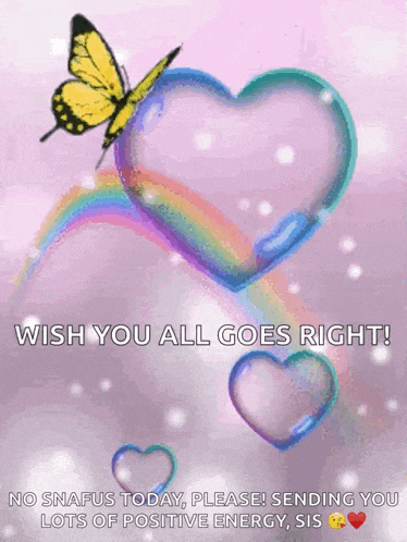a butterfly is flying over a heart shaped soap bubble