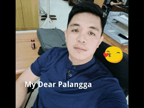 a man in a blue shirt is taking a selfie with the caption " my dear palangka " on the bottom