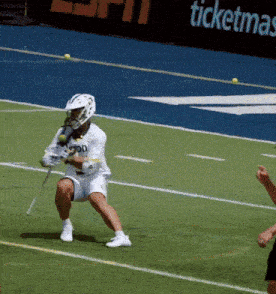 a lacrosse player in a white uniform with the word od on it