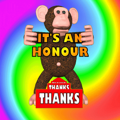 a monkey holding a red sign that says thanks