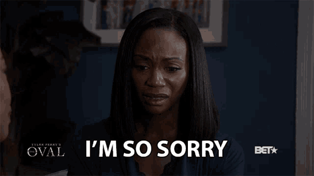 a woman says i 'm so sorry while sitting in front of a bet logo