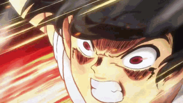 a close up of a person 's face with a very angry look on it .
