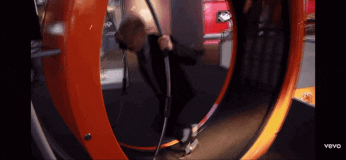 a person is riding a roller coaster in a video that says vevo