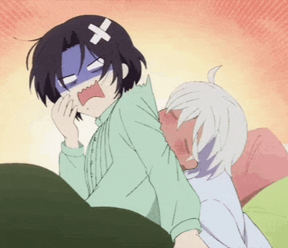 a girl with a bandage on her head is laying on a man 's lap .