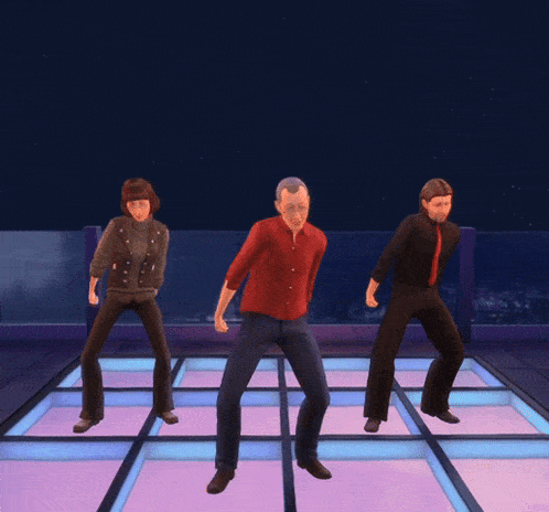 three people are dancing on a dance floor