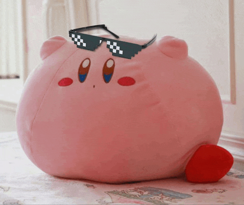 a stuffed kirby with sunglasses on his head