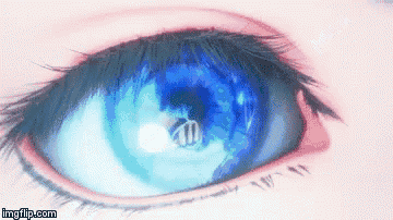 a close up of a person 's blue eye with a reflection in it .