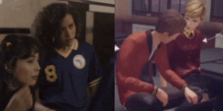a woman in a number 8 jersey is standing next to a man in a red sweater .