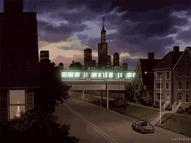 a car is parked on the side of the road in front of a city skyline and a train