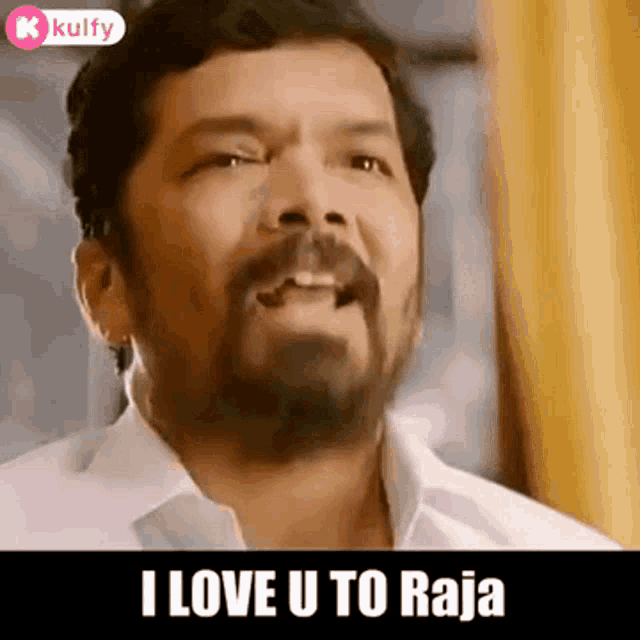 a man with a beard is saying i love u to raja .