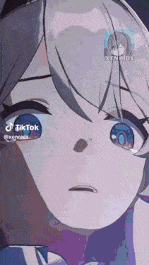 a close up of a girl 's face with a tiktok icon next to it