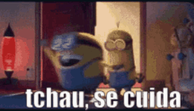 a couple of minions standing next to each other in a room with the words tchau se cuida written on the bottom .