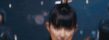 a close up of a person 's face with flames coming out of it