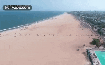 an aerial view of a beach with the words kulfyapp.com on the bottom right