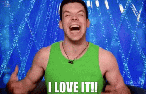 a man in a green tank top is giving a thumbs up and saying " i love it "