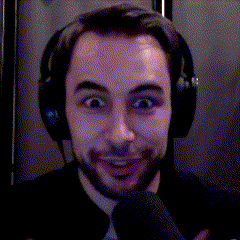 a man wearing headphones says " you 're doing " in front of a microphone