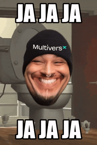 a man wearing a hat that says multiverse on it is sitting on a toilet