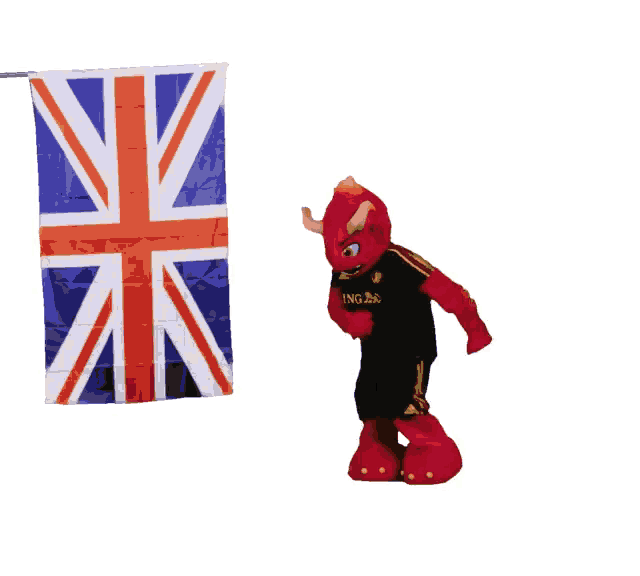a mascot is holding a british flag