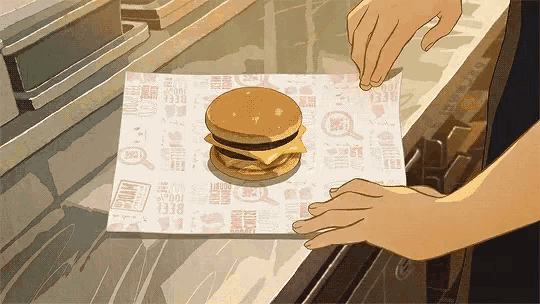 a cartoon drawing of a hamburger on a piece of paper that says beef