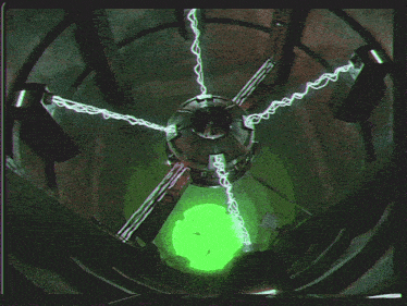 a green lightning bolt is coming out of the center of a dark room