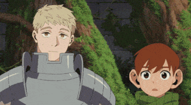 a man in armor and a boy in a green scarf stand next to each other