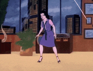 a woman in a purple dress and tie is dancing