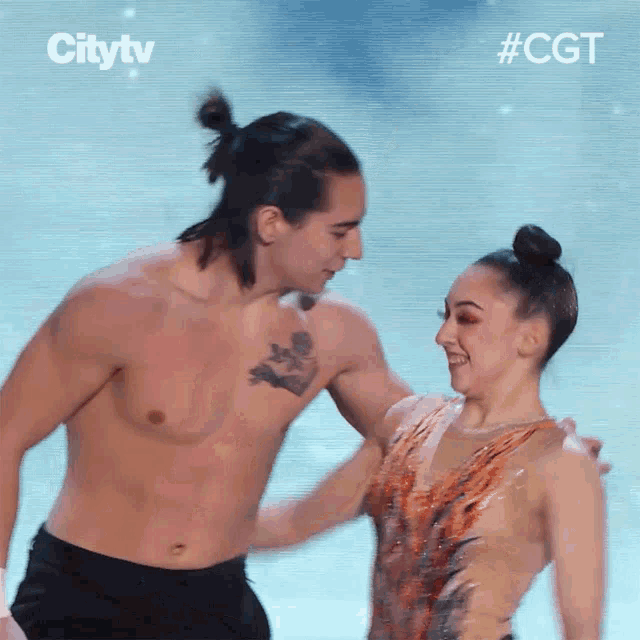a man without a shirt is standing next to a woman in a leotard and the hashtag #cgt is above them