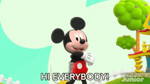 mickey mouse is saying hi everybody in a cartoon .