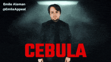 a man in a black jacket is standing in front of a poster that says cebula