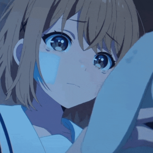 a close up of a person 's face with a blue mask on