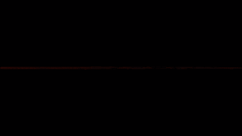 a silhouette of a person standing on a balcony with a book in their hand