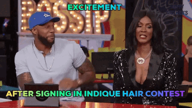 a man and a woman are sitting at a table with excitement after signing in indicque hair contest written on the screen
