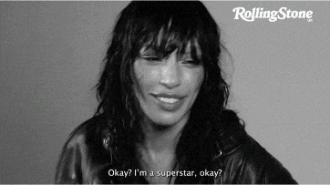a black and white photo of a woman with the words okay i 'm a superstar okay on the bottom