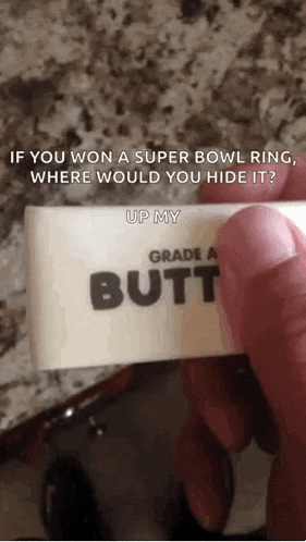 someone is holding a piece of paper that says grade a butt on it