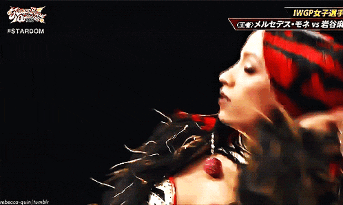 a woman with red hair is on a screen that says stardom on it
