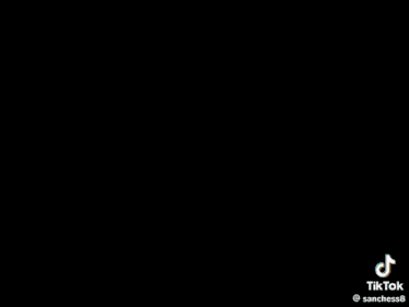 a close up of a black object with a tiktok logo