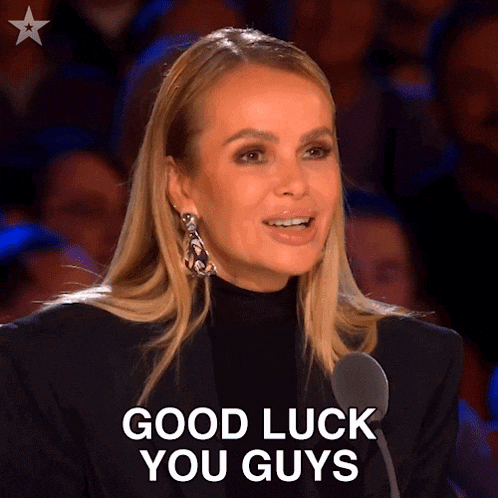 a woman says good luck you guys in front of a crowd of people