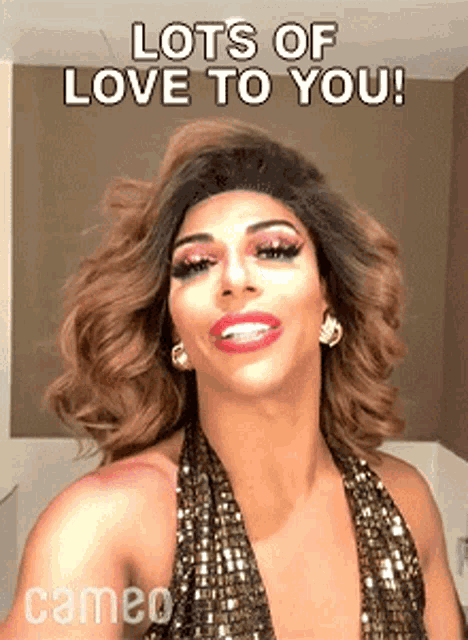 a picture of a drag queen with lots of love to you written on it
