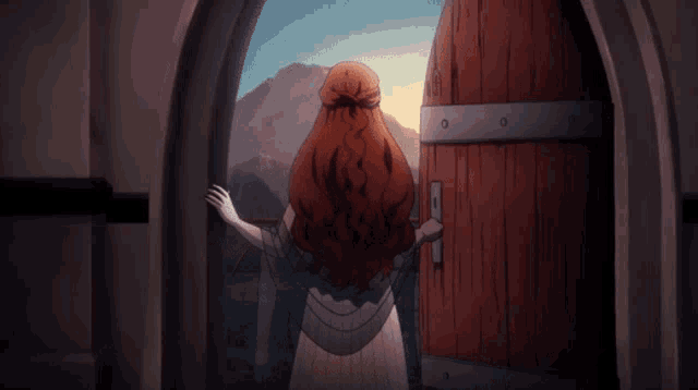 a woman with long red hair is standing in a doorway