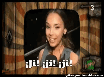 a gif of a woman talking into a microphone with the words ji ji ji